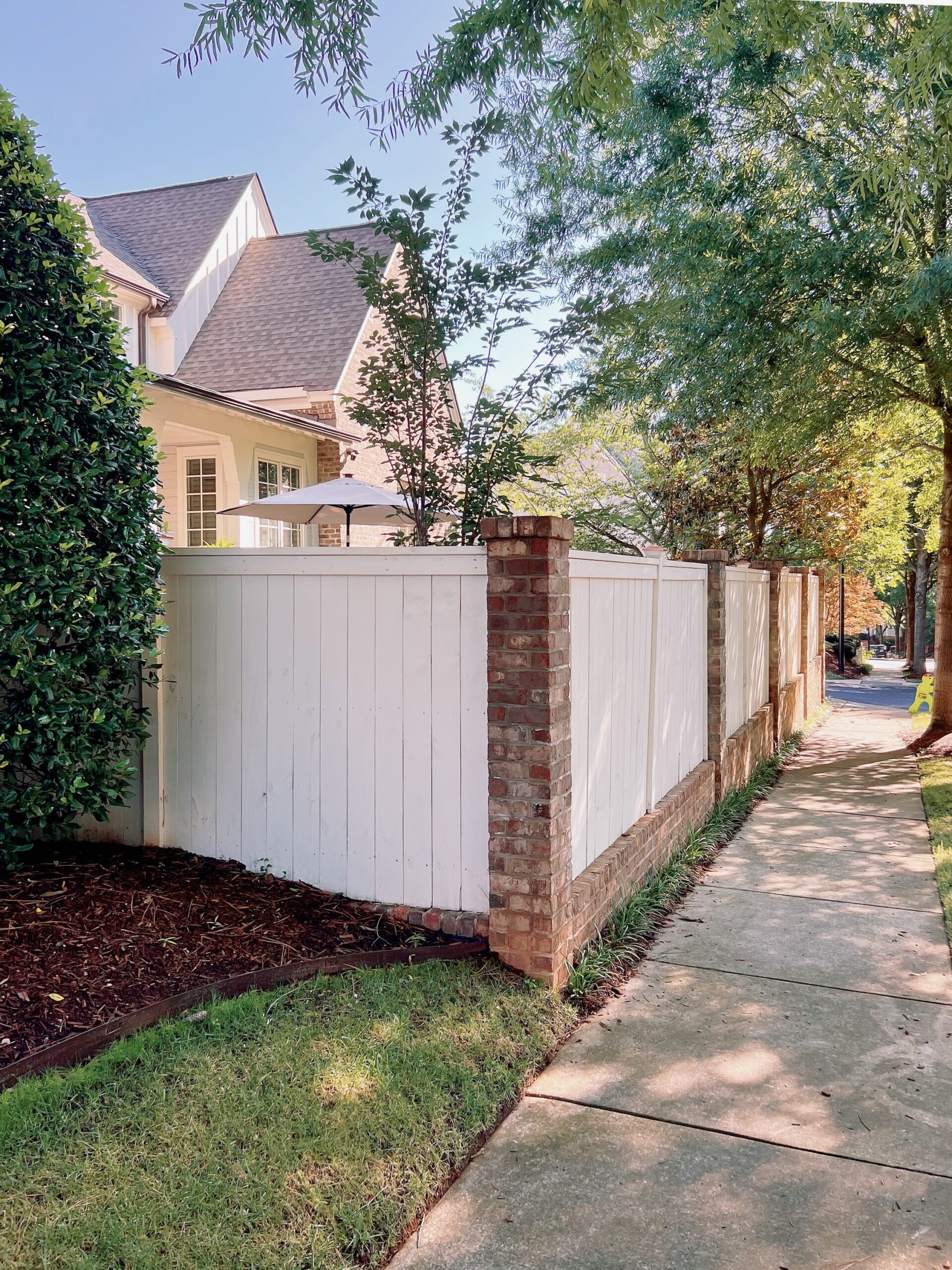 Wood Privacy Fence with Brick Columns Franklin and Nashville Fence Company