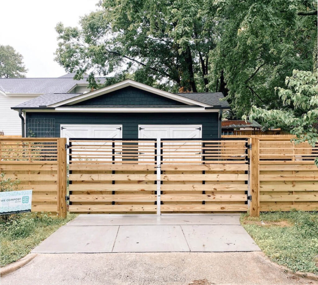 Cedar vs pressure-treated fence Franklin driveway